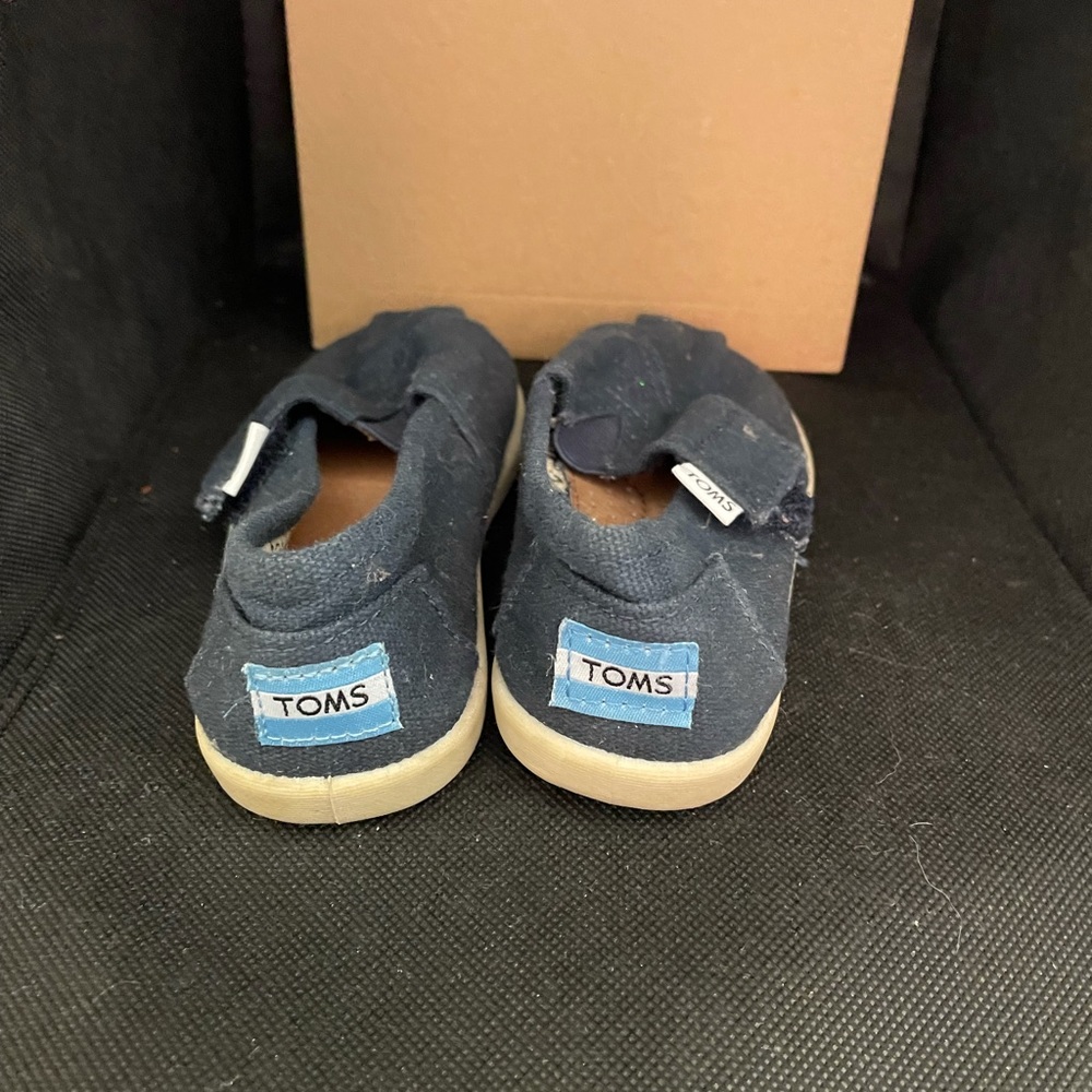 Size 9 navy blue TOMS shoes for kids